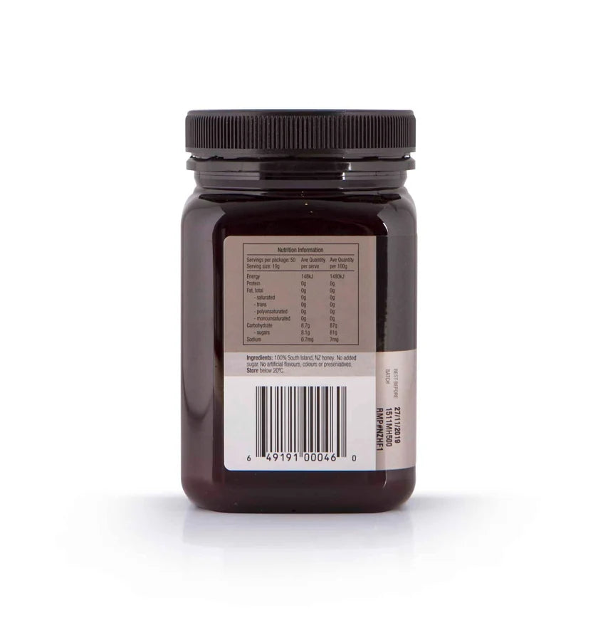 A 500g jar of WellNest Mānuka Honey MGO500+ with golden honey inside, labeled with MGO rating, on a white background.