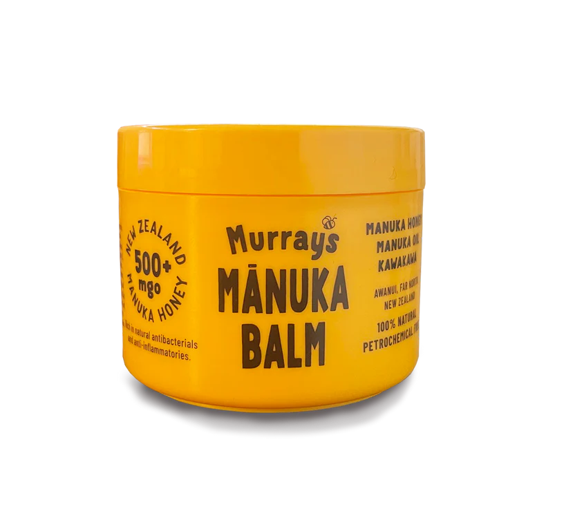 Murray's Mānuka Balm in a 75ml glass jar, WellNest skincare product with a white lid and label showing natural ingredients.