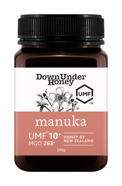 WellNest Mānuka Honey UMF™ 10+ in a 500g amber jar, featuring a label with UMF and MGO ratings, front view.