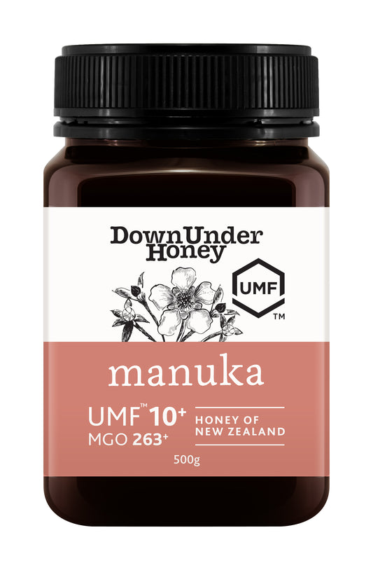WellNest Mānuka Honey UMF™ 10+ in a 500g amber jar, featuring a label with UMF and MGO ratings, front view.