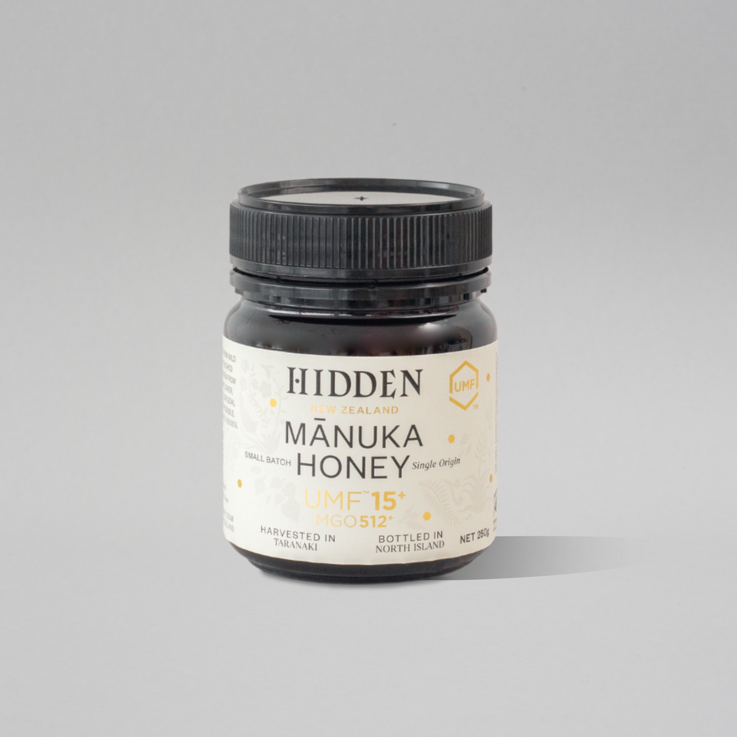 WellNest UMF15+ Manuka Honey in 250g jar, showcasing golden, viscous honey with UMF and MGO labels on the jar.