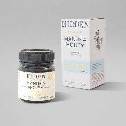 WellNest UMF15+ Manuka Honey in 250g jar, showcasing the golden, thick honey with UMF and MGO labels visible.