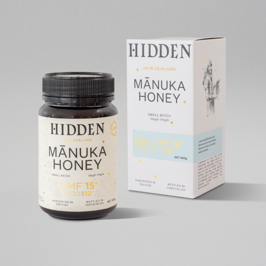 WellNest UMF15+ Manuka Honey in a 500g jar, showcasing the golden, thick honey with a natural texture and label.