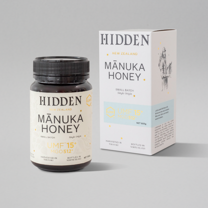 WellNest UMF15+ Manuka Honey in a 500g jar, showcasing the golden, thick honey with a natural texture and label.