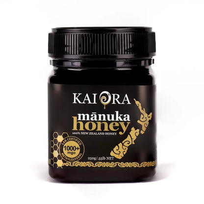 Jar of WellNest Kai Ora Black Label Manuka Honey with 1000+ MGO, showing the dark honey and label details.