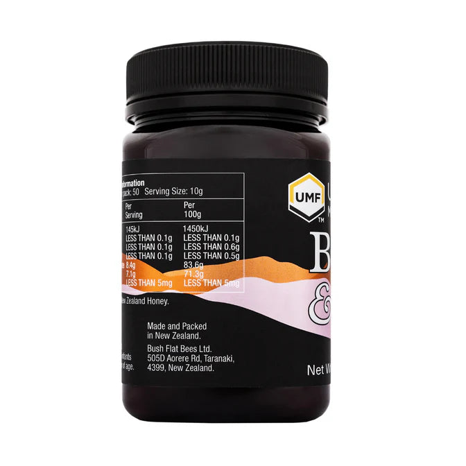 WellNest Bee & Flow Raw Manuka Honey UMF 15+ with MGO 550+ in a jar, showcasing the golden, viscous honey from New Zealand.