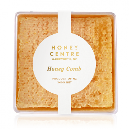 Raw Manuka honeycomb from WellNest, 340g jar with golden honey-filled comb, showcasing natural texture and rich amber color.