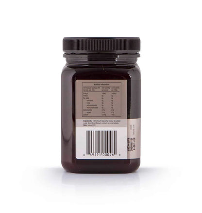A 500g jar of WellNest Mānuka Honey MGO500+ with golden honey inside, labeled with MGO rating, on a white background.