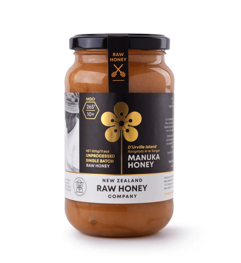 Raw Manuka Honey WellNest MGO265+ 500g jar with label and honey inside, showcasing natural, golden Manuka honey in a jar.